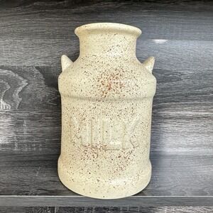 Vintage Cream/brown ceramic milk jug‎ with a speckled design and the word "MILK"
